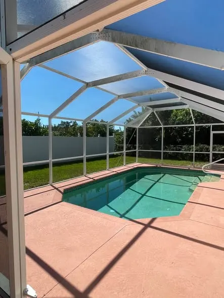Same pool cage after cleaning, bright and clear