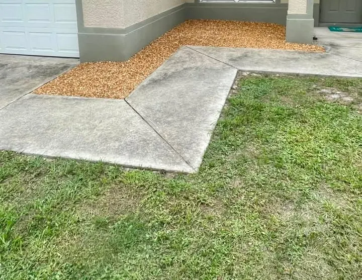 Entry bed finished with fresh decorative rock