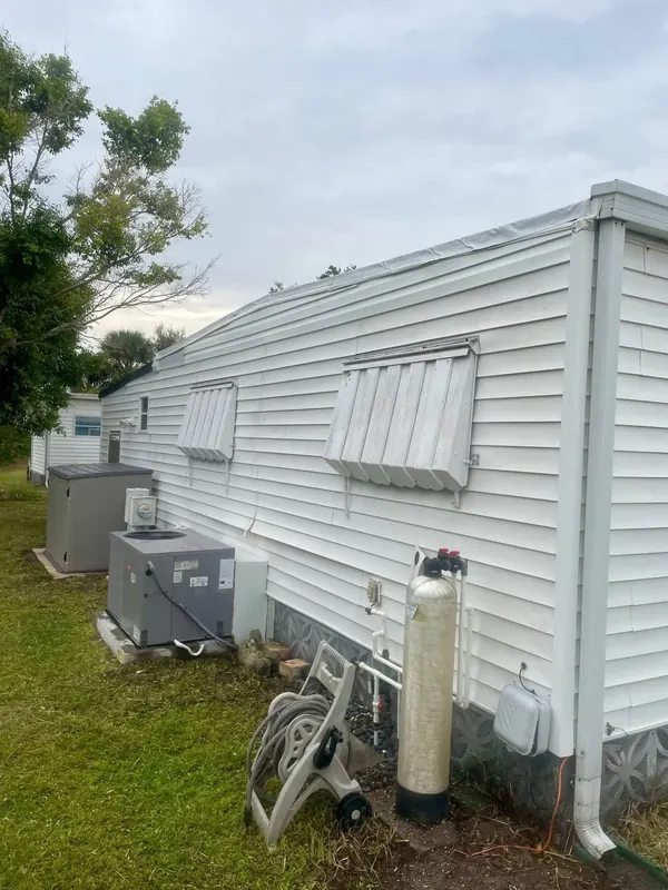 Same vinyl siding clean and bright after washing